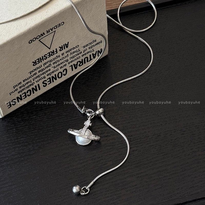 2024 New Style Pearl Saturn Pendant Necklace Advanced Sense Pull-out Adjustable Autumn and Winter Titanium Steel Woolen Chain Accessories for Women
