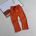 46 orange trousers