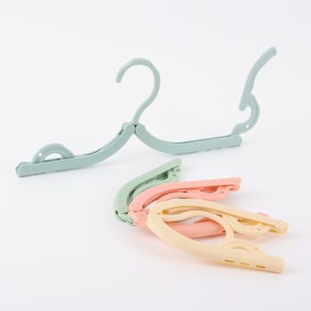 Factory Direct Supply Multifunctional Travel Folding Clothes Hanger for Business Trips, Student Dormitories, Home Essential Drying Clothes Hangers Wholesale
