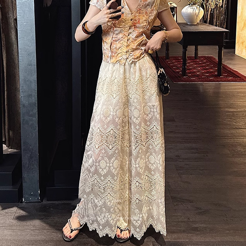 Quần dài nữ ống rộng ren thêu khoét hở lưng cao — Lan đen, Ngọc Hạnh