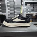 Black and white glossy leather