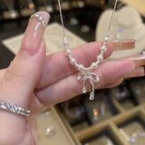 Серебряный бант жемчужное ожерелье женское 2026 новый горячий стиль легкий роскошный нишевый дизайн чувство моды универсальная цепочка на ключицу