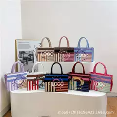 Cross-border women's bag foreign trade new European and American texture personality round letter design commuter trend portable slung tote bag