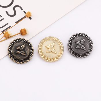 Overlocked butterfly metal hand-stitched buttons with full design and exquisite temperament. wholesale and retail of coat shirt buttons.