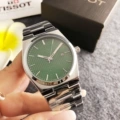 Silver shell green surface