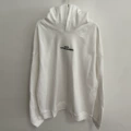 White inverted letter embroidery
