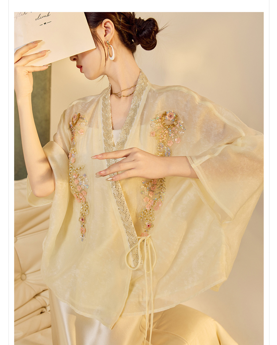 Áo khoác cardigan nữ dáng rộng thêu đính cườm chất liệu tencel phong cách nhẹ nhàng — mơ