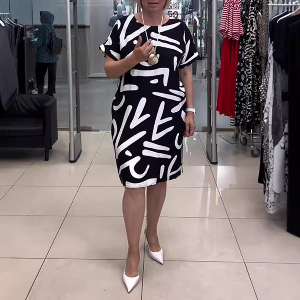 Fashionable Womens Loose Fit V Neck Short Sleeve Dress Floral Print Autumn Collection Wholesale Available