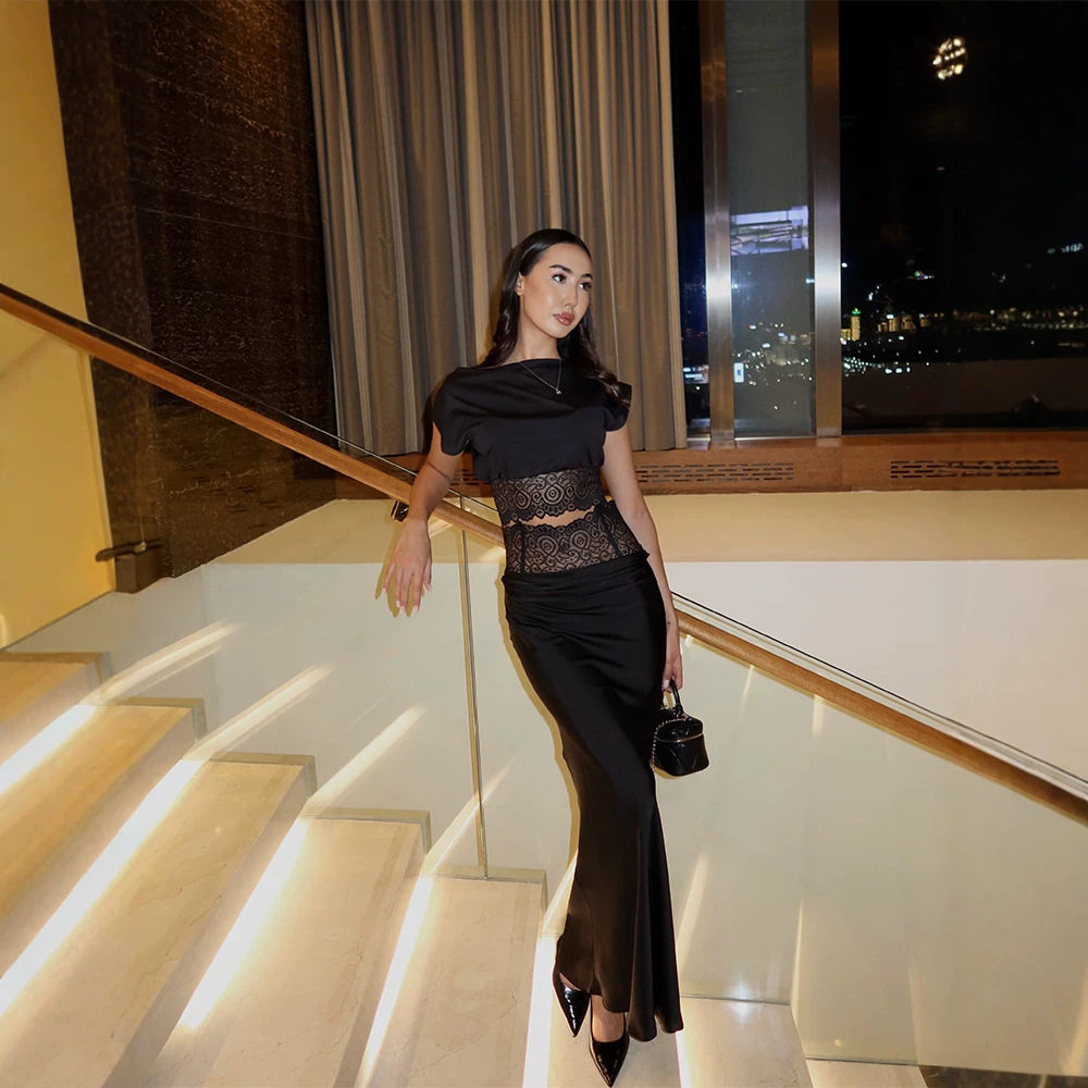 Black Asymmetrical Neck Top and Lace Trimmed Skirt Set Elegant Two Piece Outfit for Women Perfect for Parties and Events