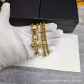Golden white diamond cross + gold letter chain