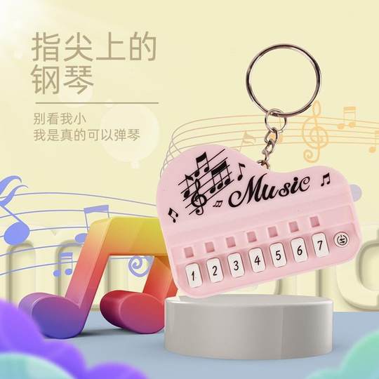 Creative electronic luminous performance handheld small game pendant mini piano keychain electronic organ toy wholesale
