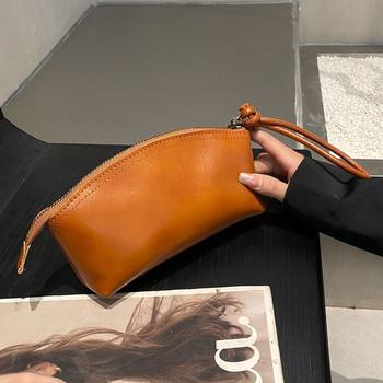 Fashionable travel spring and summer new niche design pu leather retro elegant hand-carrying cross-border large-capacity dumpling wallet for women