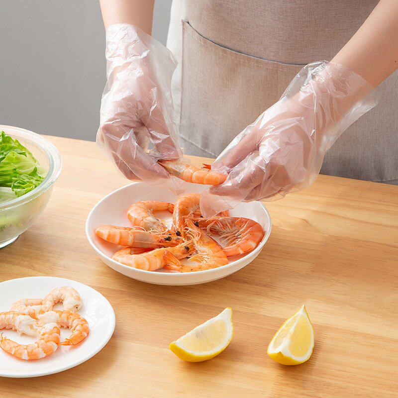 Xinyihe disposable gloves food catering household pe gloves kitchen plastic transparent waterproof film gloves