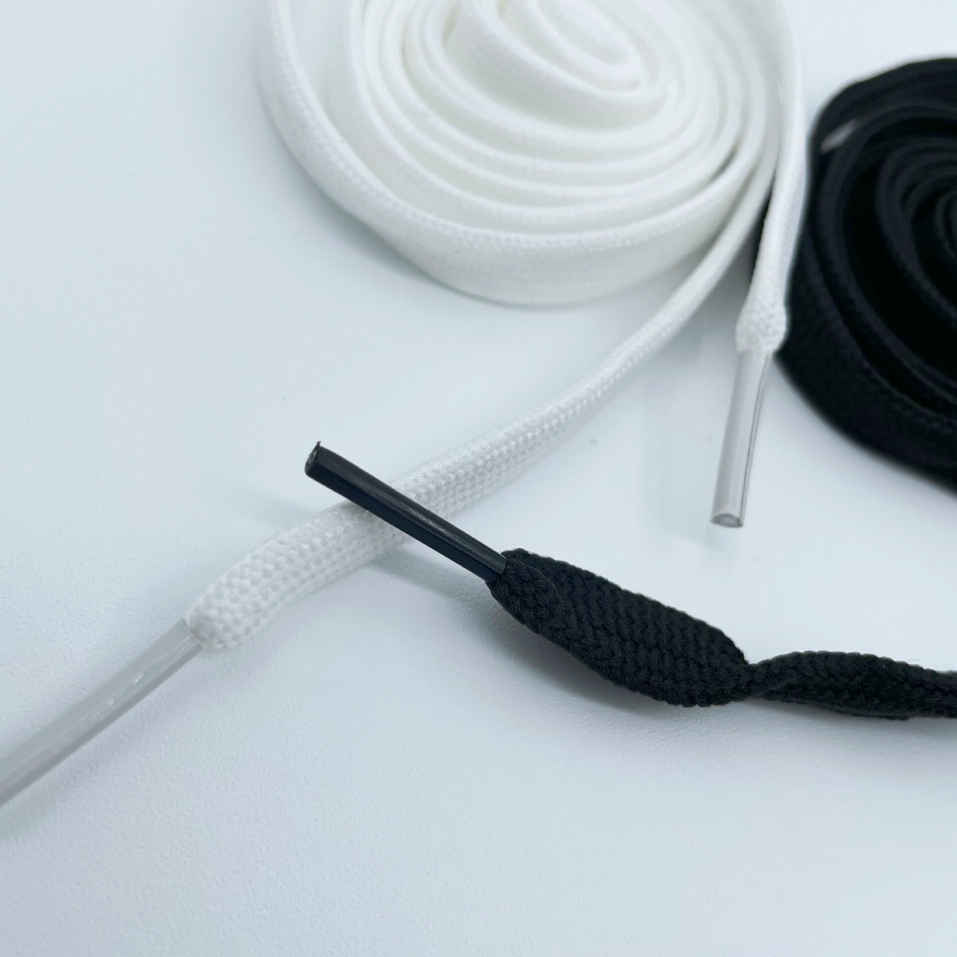 Factory 1cm thick polyester rope double hollow flat shoelace waist rope black and white sweater rope hat rope wholesale