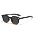 Tortoiseshell framed black and gray pieces