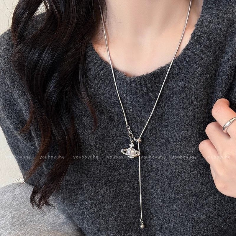 2024 New Style Pearl Saturn Pendant Necklace Advanced Sense Pull-out Adjustable Autumn and Winter Titanium Steel Woolen Chain Accessories for Women
