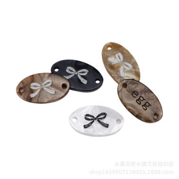64 Types of In-Stock Imitation Shell Resin Trademark Tags, Letter Oval Bow Clothing Labels, High-End Versatile Decorative Buttons