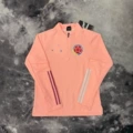 [pink] colombian half-zip training uniform