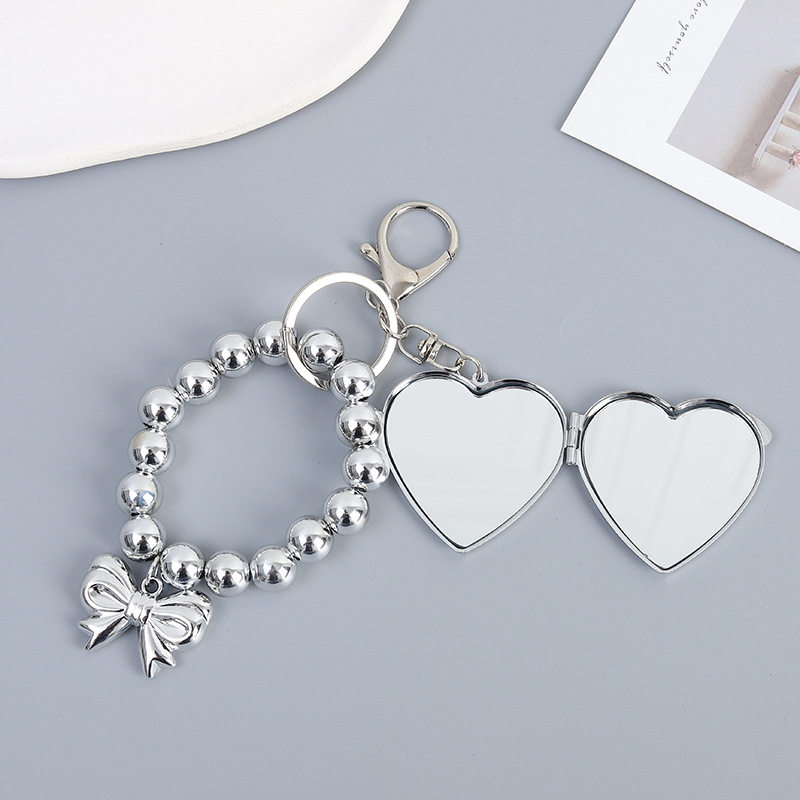 Creative New Silver-plated Love Bow Pendant Fashion All-match UV Bead Hanging Luggage Keychain Beaded Accessories