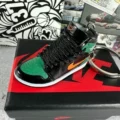 103. black, green and orange + box