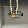 Golden saturn pearl necklace