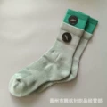 Dark green long tube