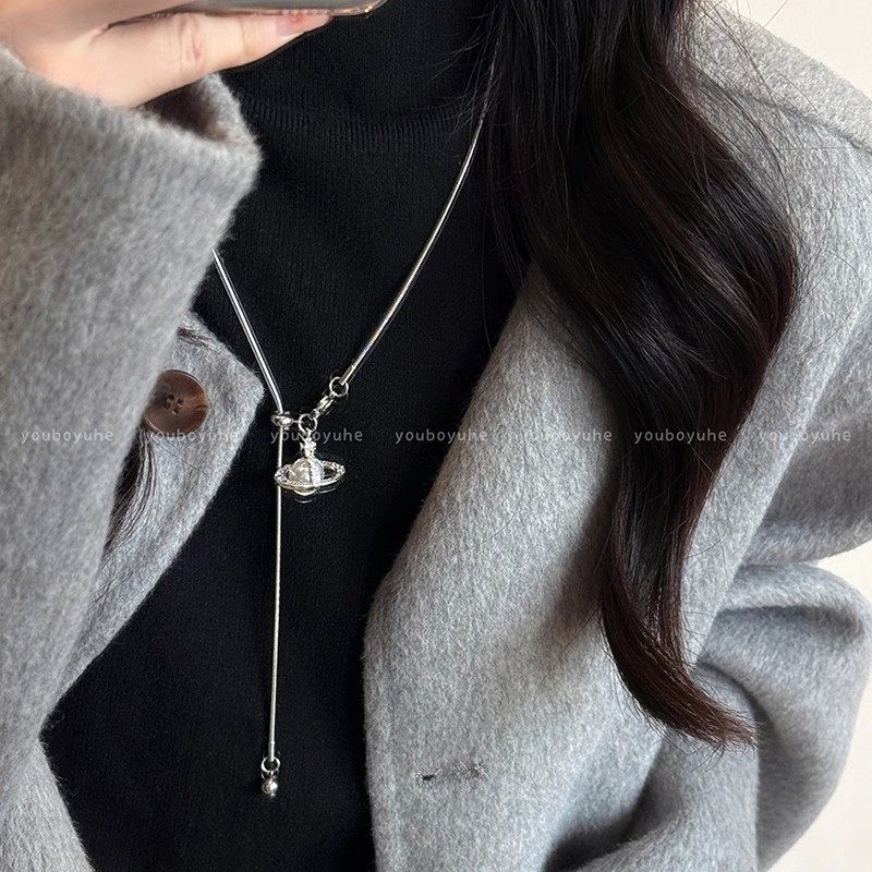 2024 New Style Pearl Saturn Pendant Necklace Advanced Sense Pull-out Adjustable Autumn and Winter Titanium Steel Woolen Chain Accessories for Women