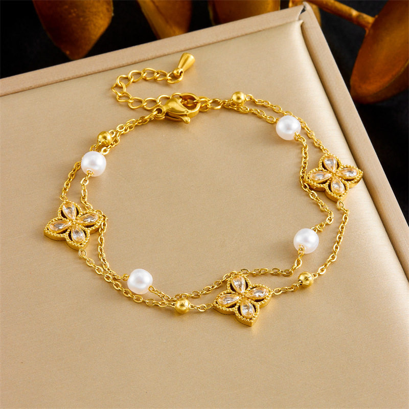 สั่งซื้อนำเข้า แฟชั่นข้ามพรมแดนเพชรรูปเพชรสี่กลีบดอกไม้สองชั้นซ้อนกันโซ่มุกเครื่องประดับเรขาคณิตสร้อยข้อมือสแตนเลส จากจีน 1688 taobao alibaba tmall