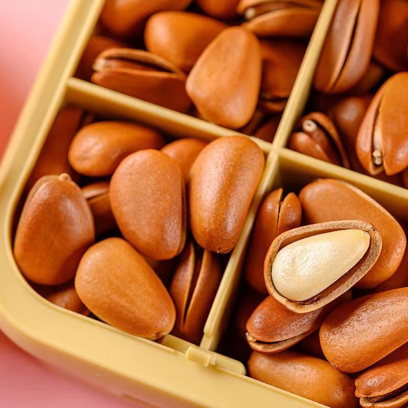 Herbal flavor Northeast Pine nuts 100G open hand-peeled pine nuts full particles casual snacks nuts specialty