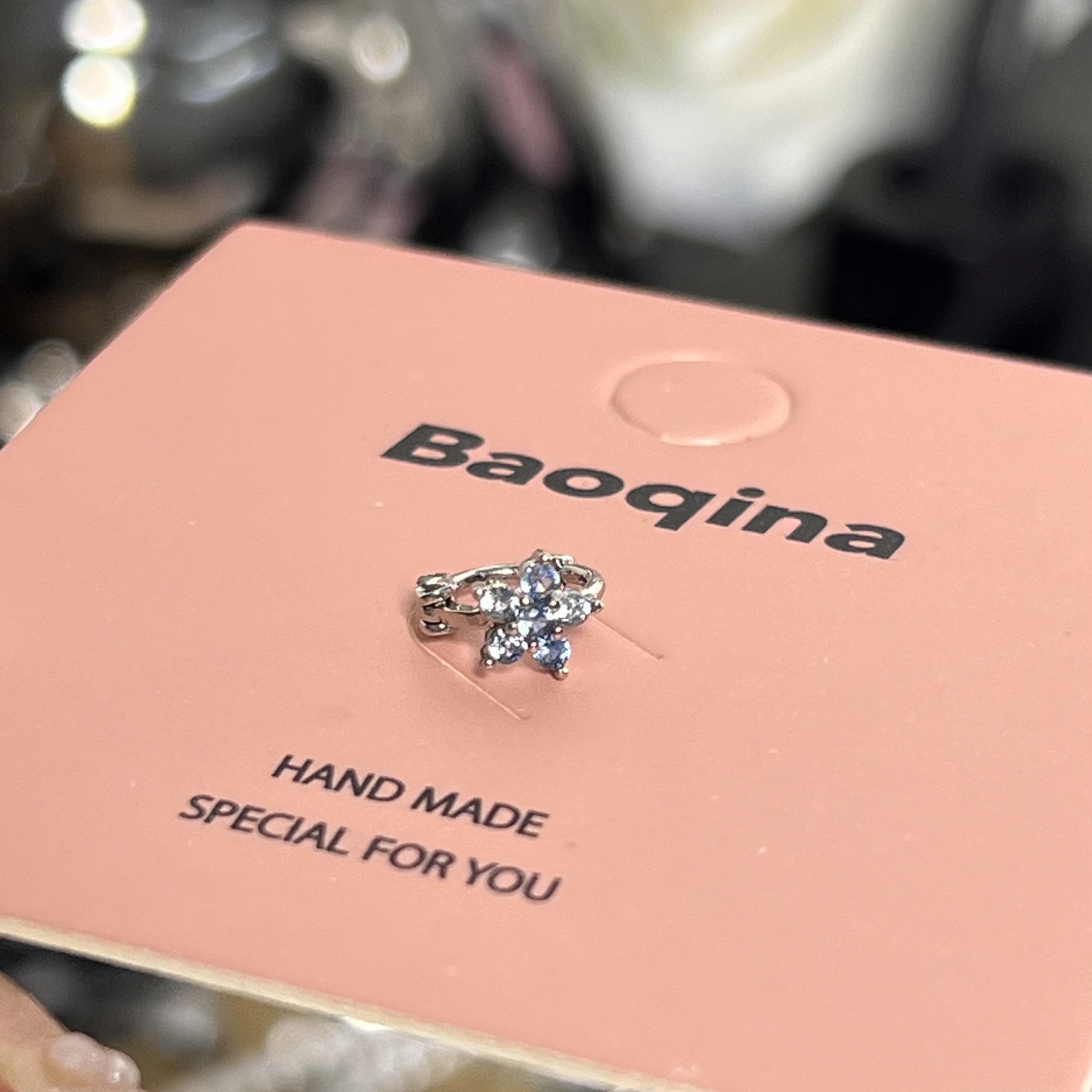 962ブルージルコニウムフラワーイヤーボーンバックル（シングル）