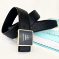 Gold buckle black belt
