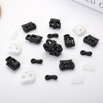 In stock plastic pig nose buckle spring buckle double hole black white oval hole small ear big ear rope buckle wholesale