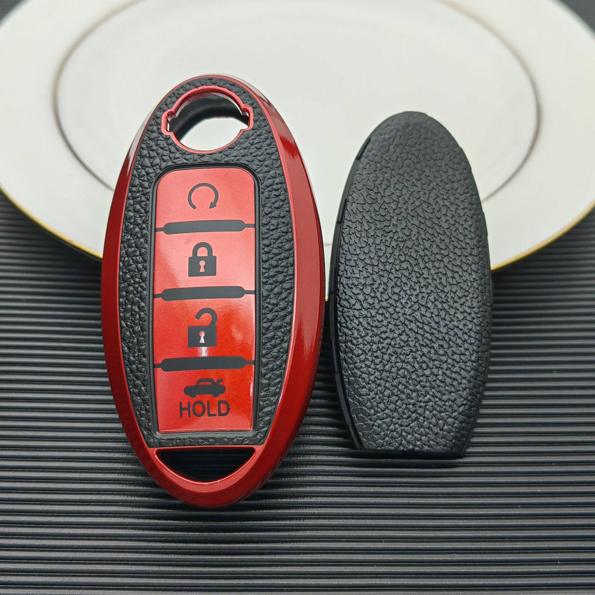 Suitable for Nissan key case new Teana Xuanyi Qida Qijun Blue Bird Tule qashke Nissan key case shell buckle