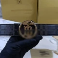Embossed circle tb gold buckle