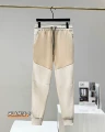 Off-white and khaki trousers