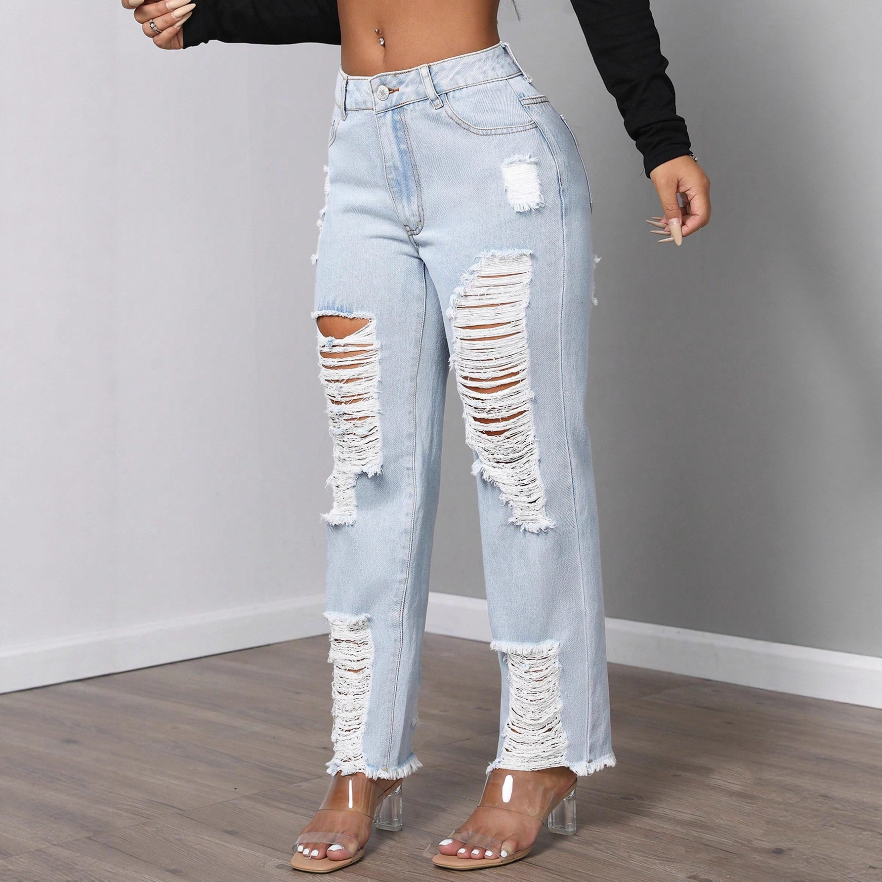 Womens Mid Rise Fashionable Ripped Denim Jeans Casual Style Comfortable Fit Versatile Wear Wholesale Available