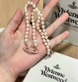 Saturn pearl necklace (rose gold)