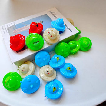 Mini Spinning Top Toy for Children, Plastic Cartoon Expression Ufo Hand-Twist Top, Can Hold Candy, Wholesale