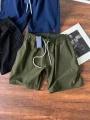 Shorts army green orange label