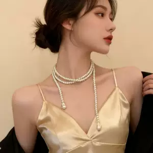 สร้อยคอไข่มุกสำหรับผู้หญิง สายโซ่แมตช์กับเสื้อสเวตเตอร์ ดูสง่างามและใช้งานได้หลากหลาย สไตล์ยาว ดูมีสไตล์และเรียบง่าย มีหลายชั้น เหมาะสำหรับสวมซ้อนทับ เป็นเครื่องประดับเสื้อผ้า ขายส่ง
