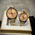 Champagne-colored rose gold tray - male on the left, female on the right