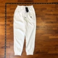 White sweatpants with black label