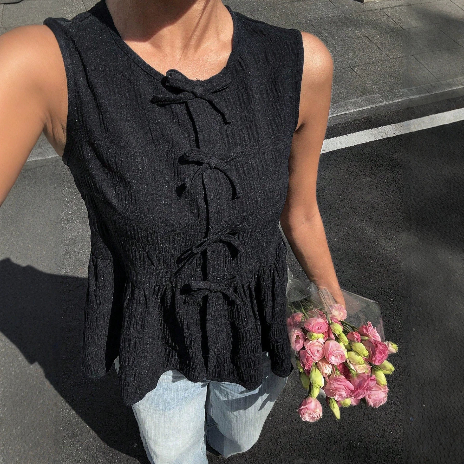Sleeveless Bow Decorated Top Slim Fit Ruffled Hem Summer Style Perfect for Casual Outings Wholesale Available