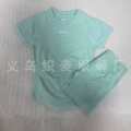 Green short sleeves + shorts