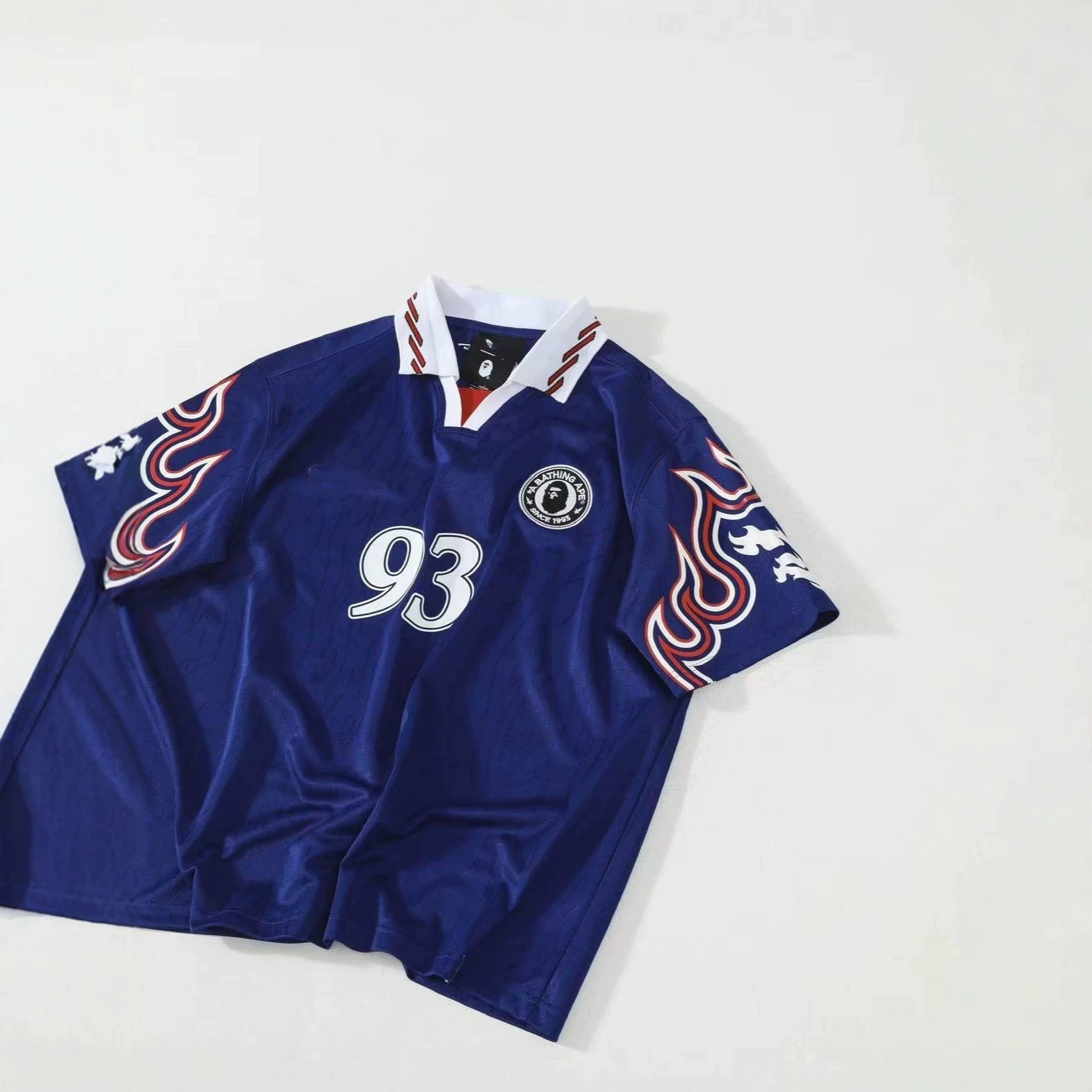 Прямые международные поставки трикотажа AD×Bap clover joint jersey - дань уважения классической рубашке поло с короткими рукавами из трикотажа 1990-х годов Изображение 1