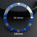 Ceramic blue circle gold lettering blue-green light