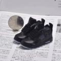 4KAWS black (a pair of nude shoes)