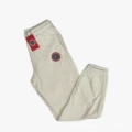 White pants with red label