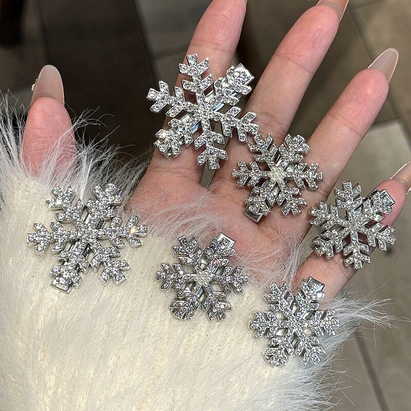 Rhinestone ประกายมุกเกล็ดหิมะคลิปเป็ดคริสต์มาสที่ดูอ่อนโยนแล...