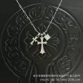 Silver sugar cube-white diamond double cross necklace